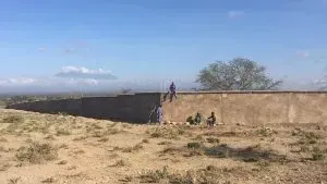 Why is there a wall around the tanzanite mines?