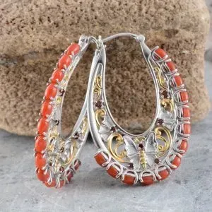 Coral hoop earrings style.