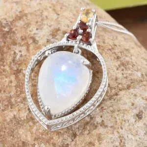 Moonstone and garnet pendant in sterling silver.