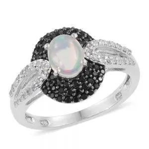 Edwardian-style opal ring with black gemstone accents