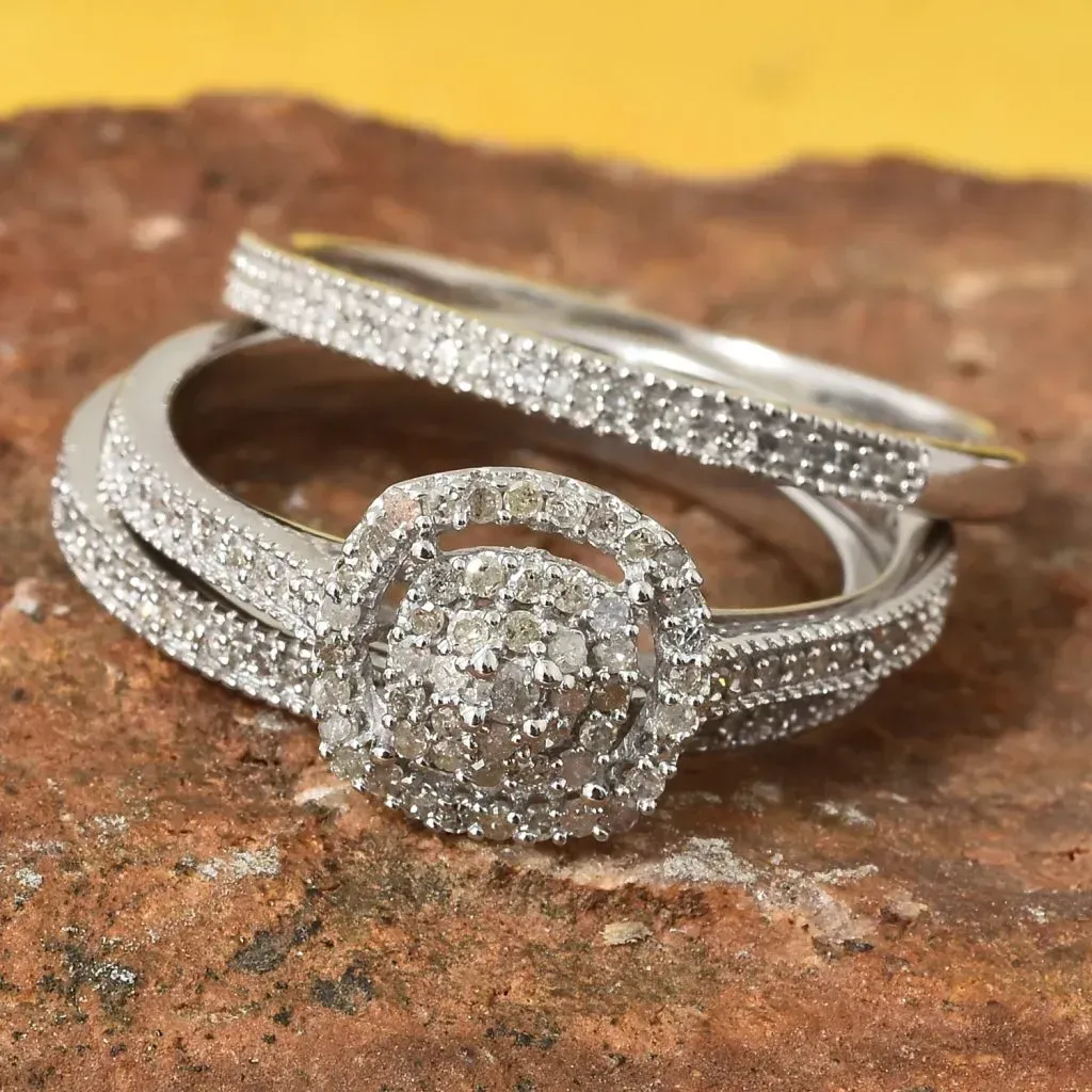 Closeup of diamond rings laid on a brown rock
