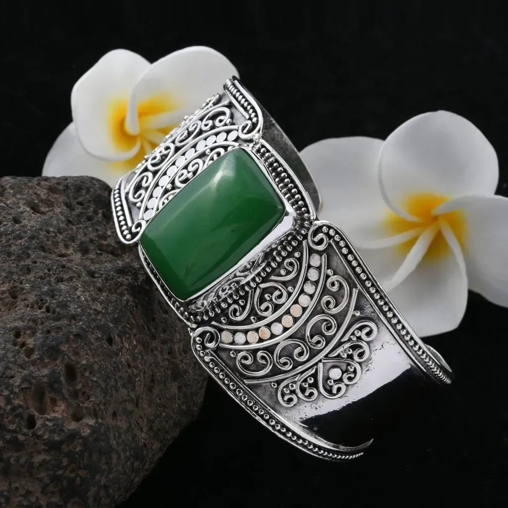 Closeup of jadeite bracelet set in silver