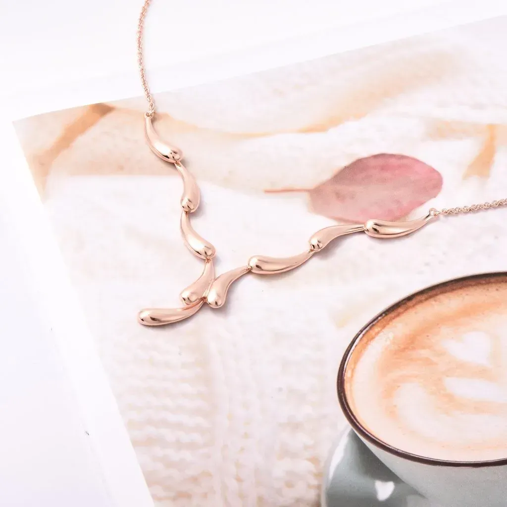 Lucy Q rose gold vermeil water necklace. 