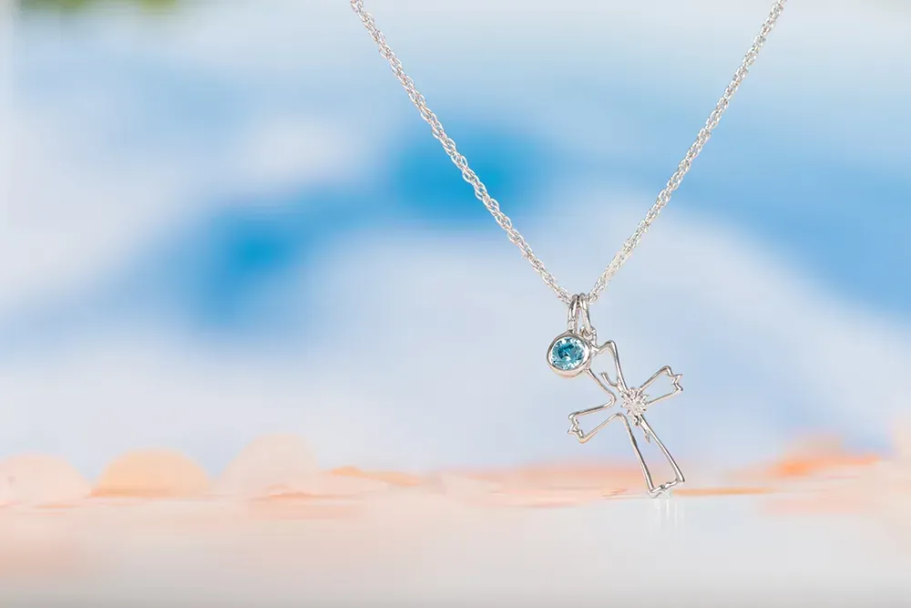 Always Believe sterling silver cross pendant.