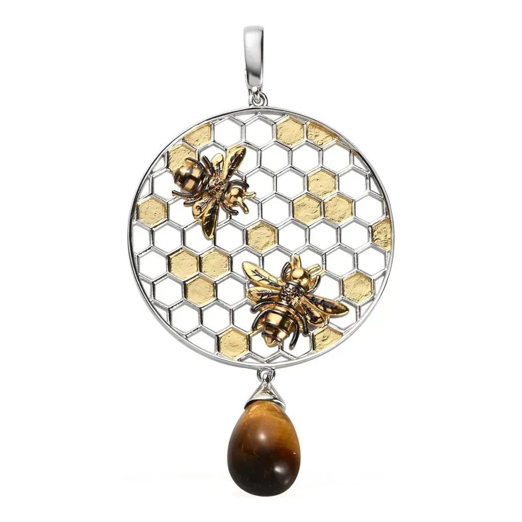 Honeycomb pendant with tiger's eye accent.