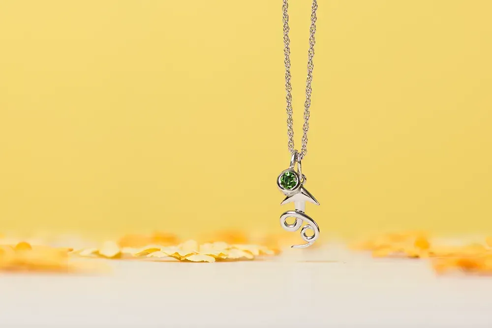 Always Rise sterling silver arrow pendant.