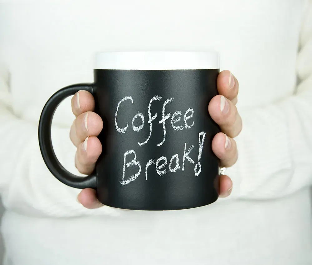 Closeup of black coffee mug