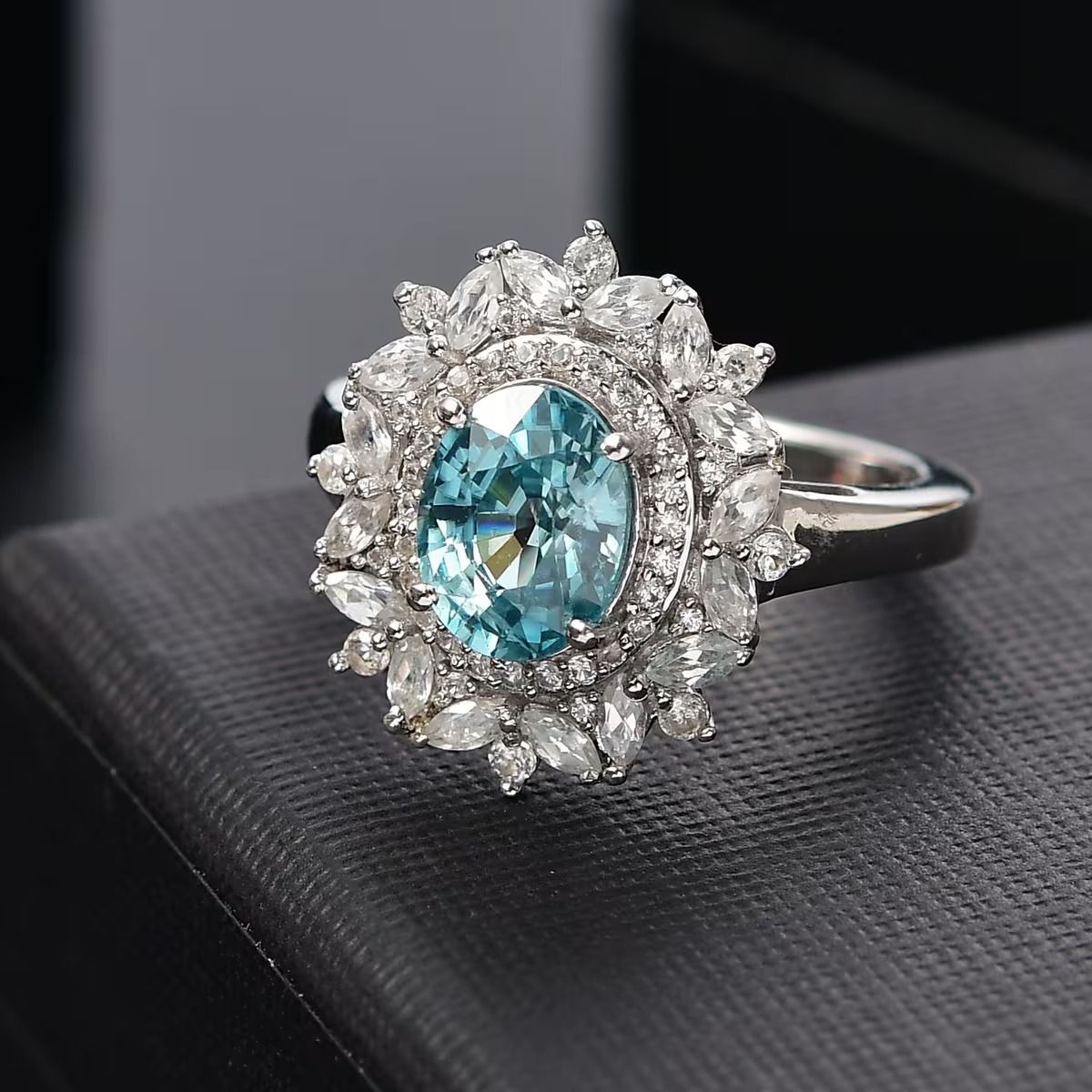 Cambodian Blue Zircon and White Zircon Blooming Halo Ring.jpg