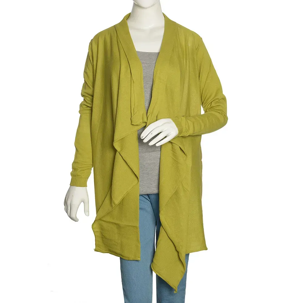 Mannequin with mustard green coverup, gray shirt and blue denim.