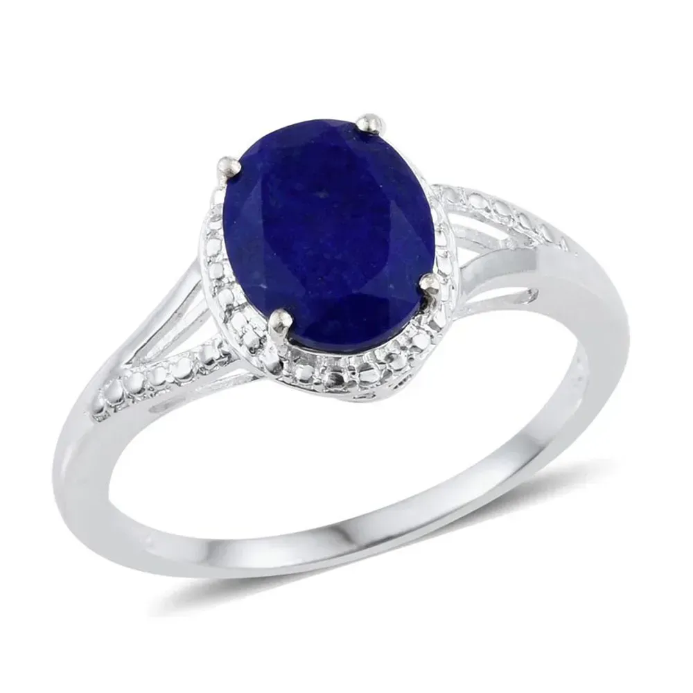 Example of placeholder ring with blue lapis lazuli against white background.