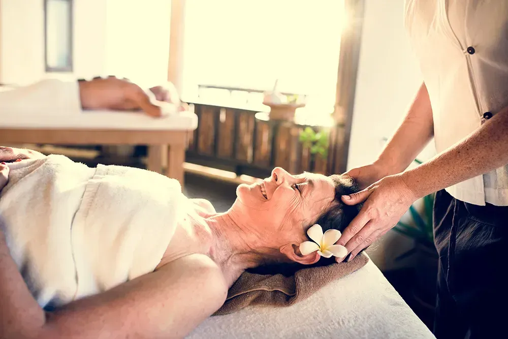 Grandmother getting treated to a massage