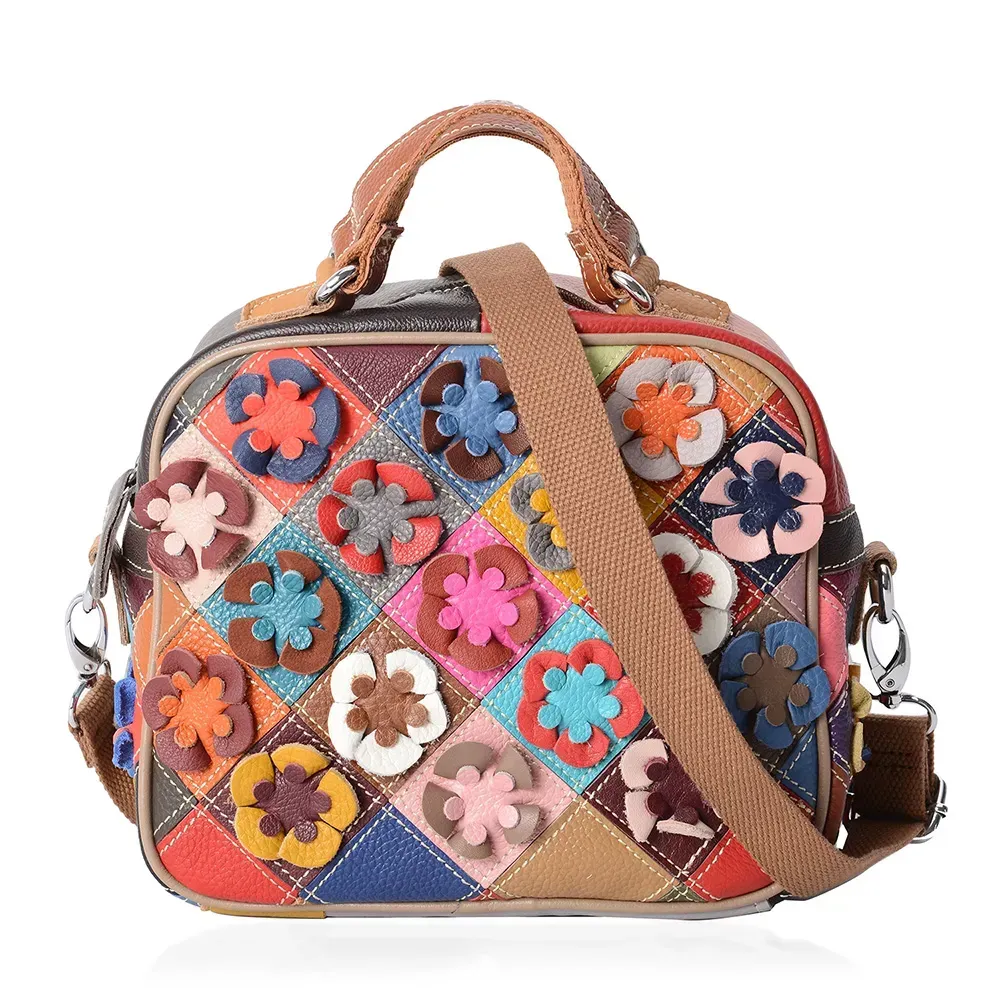Cute floral handbag against white background.