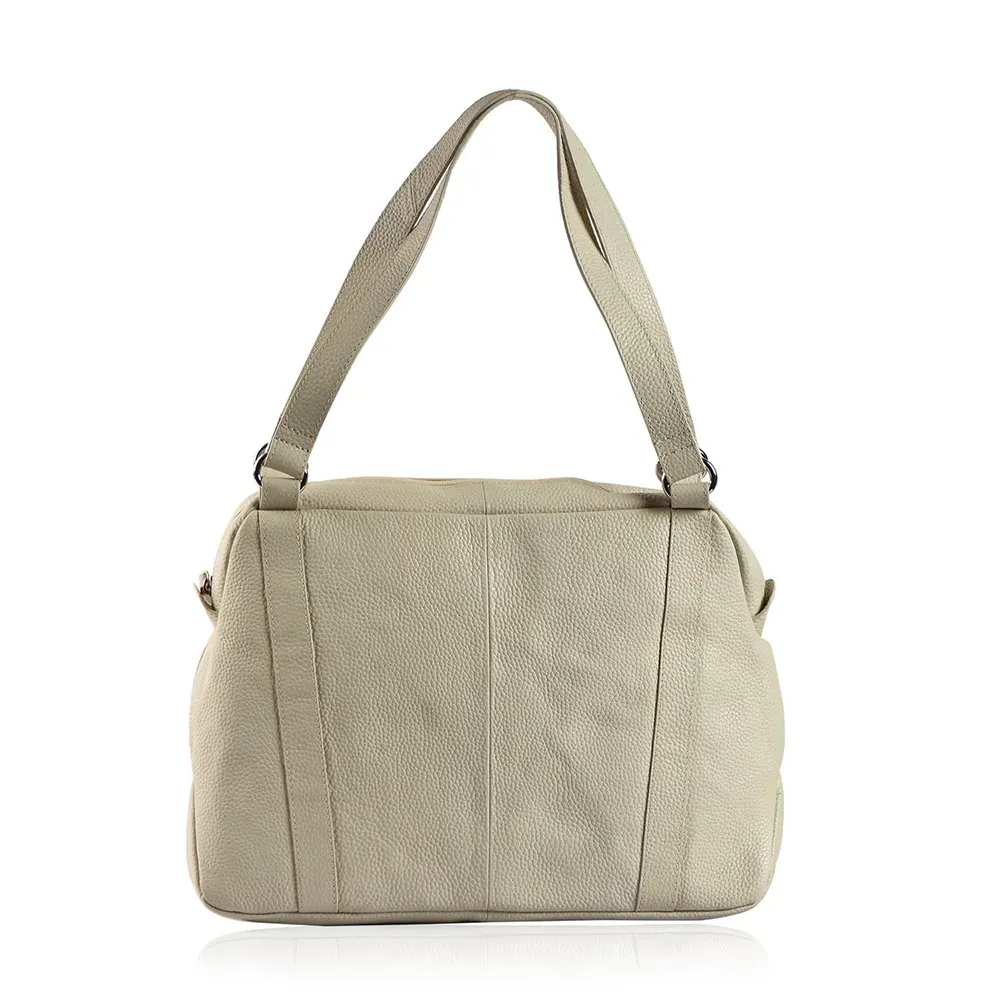 Closeup of gray handbag against white background