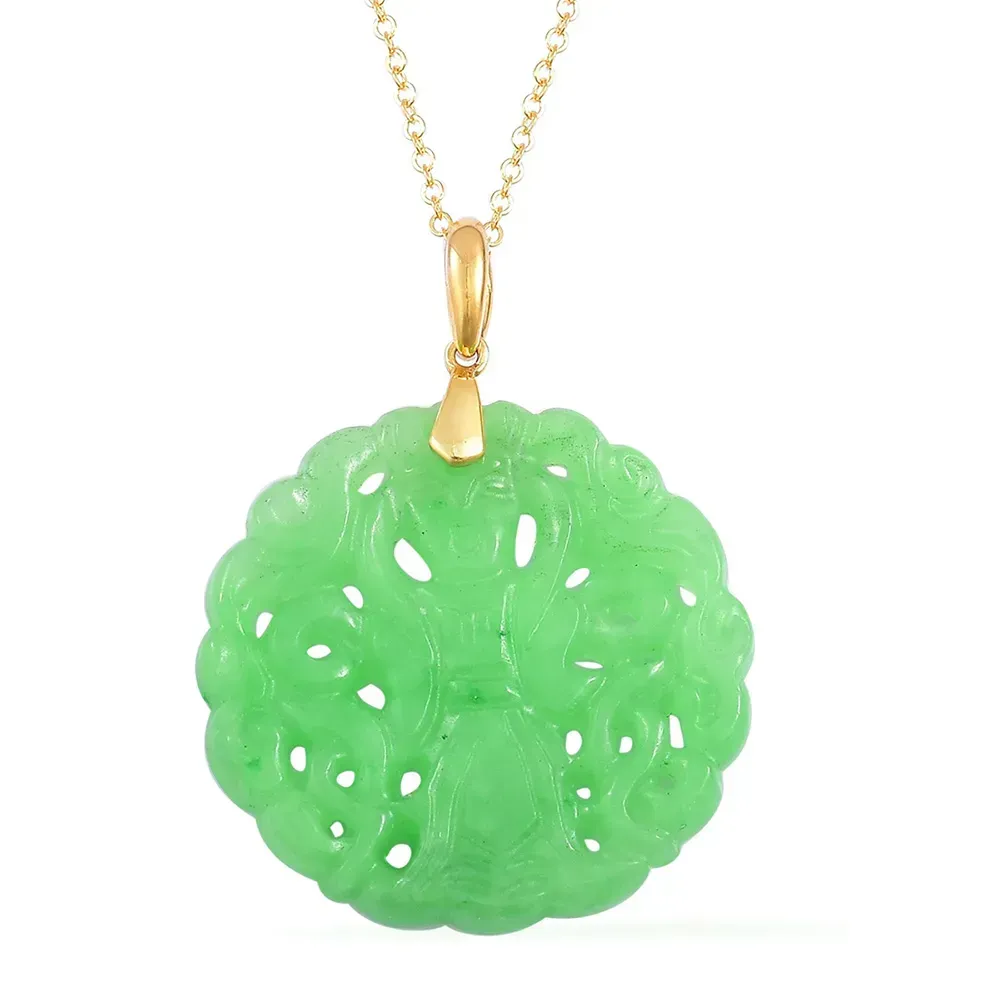 Jade necklace with gold chain against white background