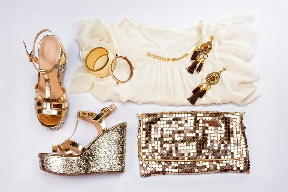Champagne outfit set with glittery clutch
