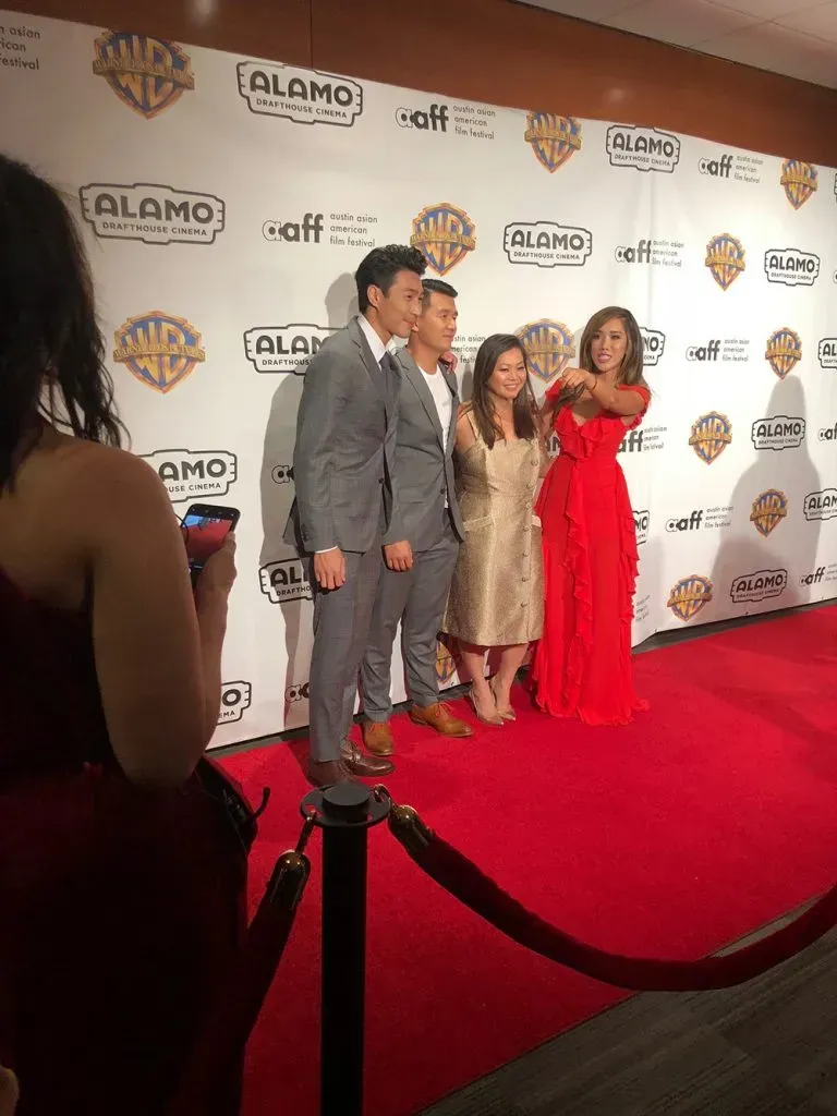 Chris Pang, Ronnie Chieng and Chloe Dao on the red carpet.