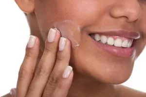 Applying moisturizer first is one of the best summer makeup tips.