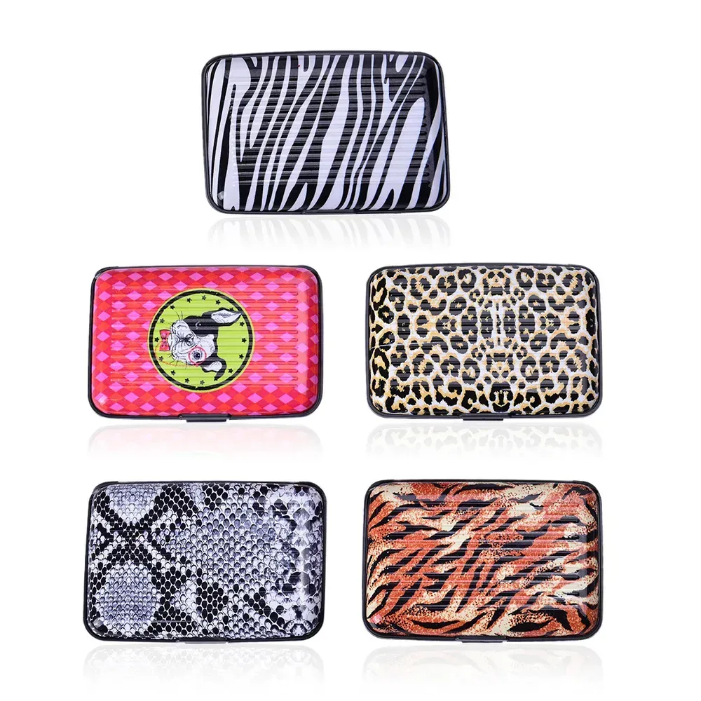 Set of five different wallets against white background.