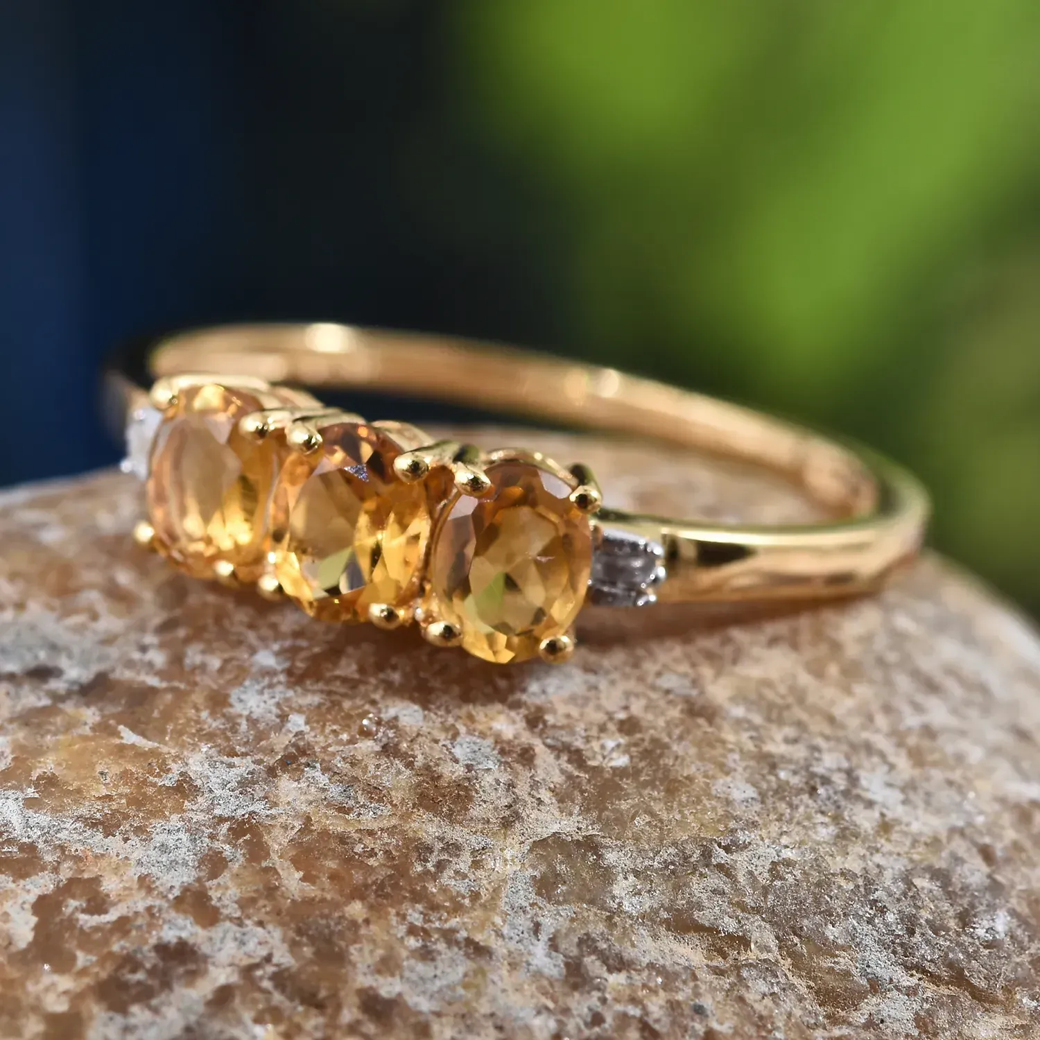 Three stone yellow citrine birthstone ring.
