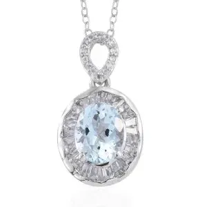 Oval aquamarine pendant on white background.