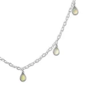Close up of green chalcedony necklace against white background.