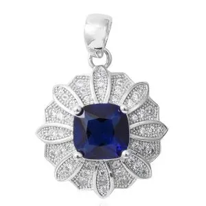 Floral-inspired blue sapphire pendant. 