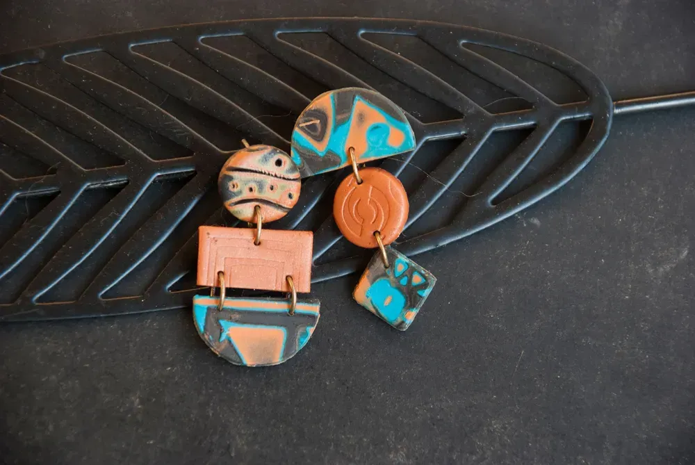 Styling the Asymmetrical Earrings Trend