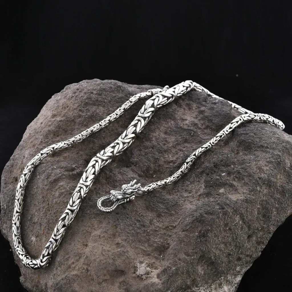 Silver Borobudur necklace with dragon head clasp.