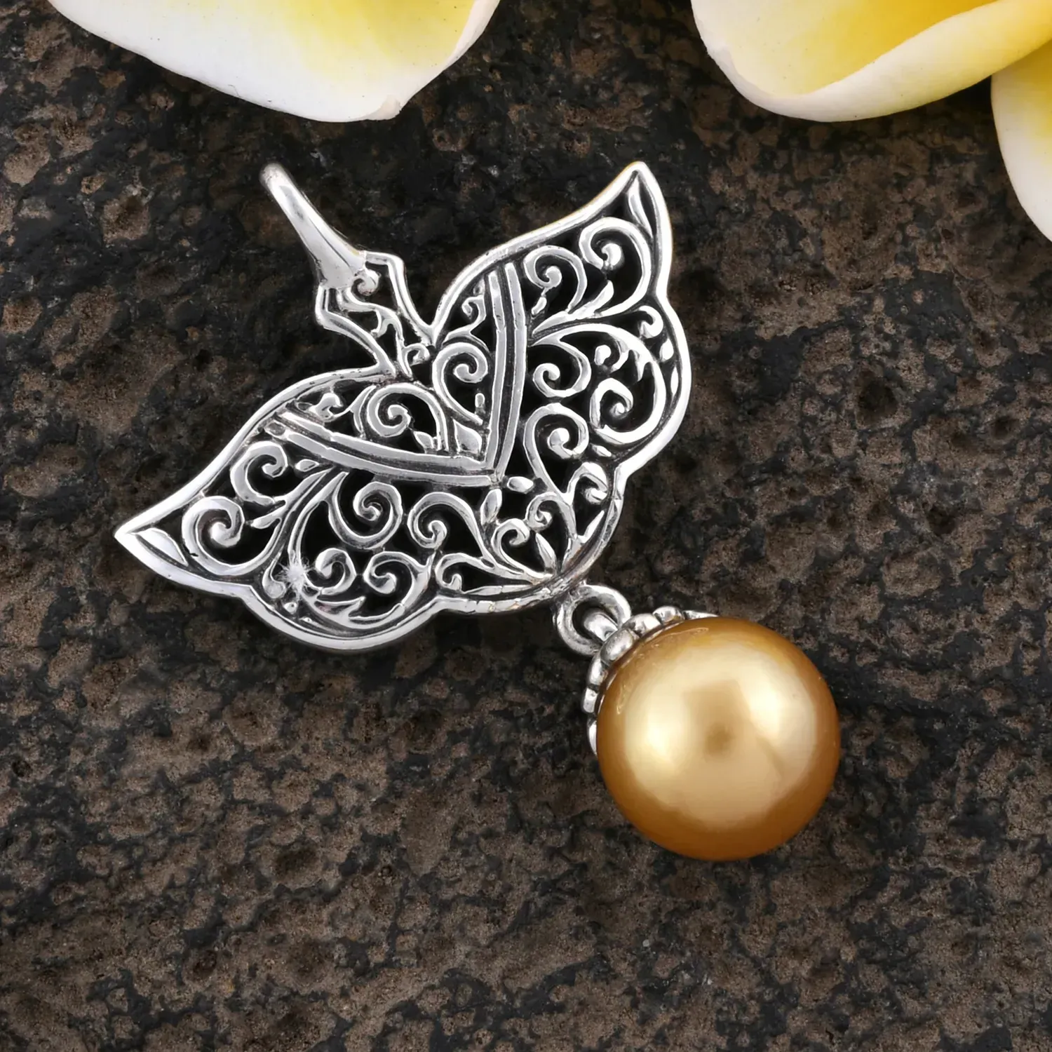 Cultured South Sea pearl pendant with fine sterling silver work. 
