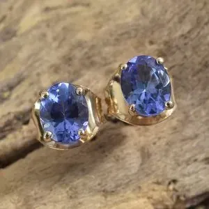 AAA tanzanite post back earrings in yellow gold. 