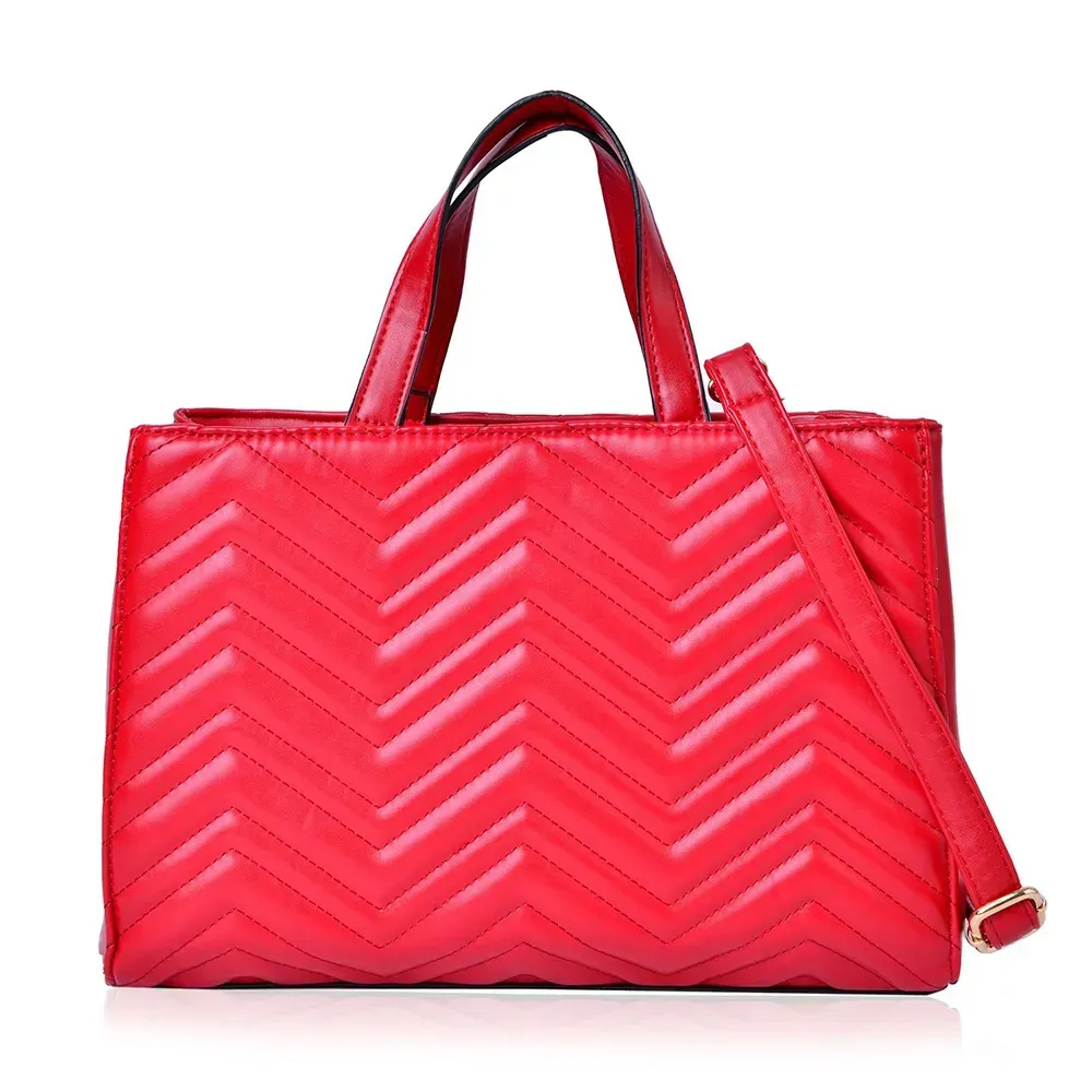 Red handbag against white background