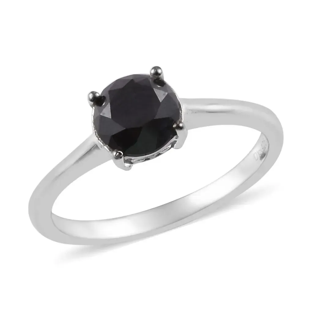 Black diamond solitaire ring.