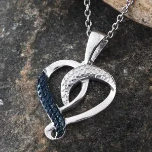 Blue diamond heart-shaped pendant in sterling silver.