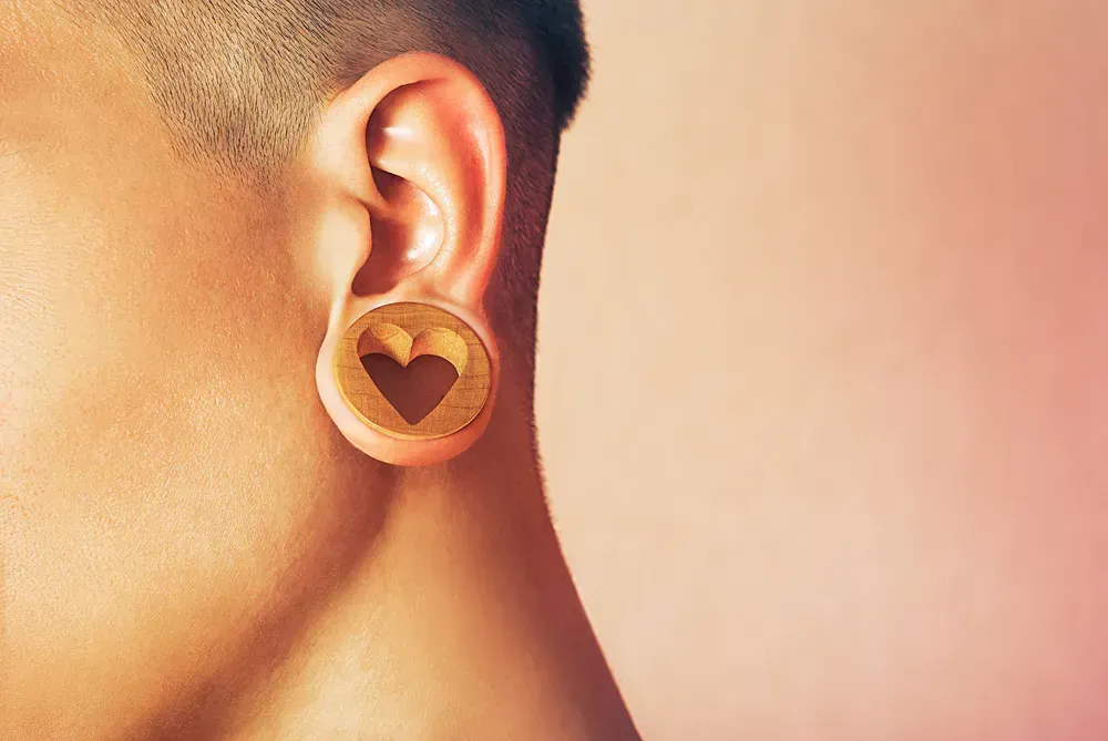 Closeup of ear gauge. 