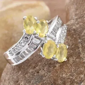 Canary opal bypass ring in sterling silver with platinum finish. 
