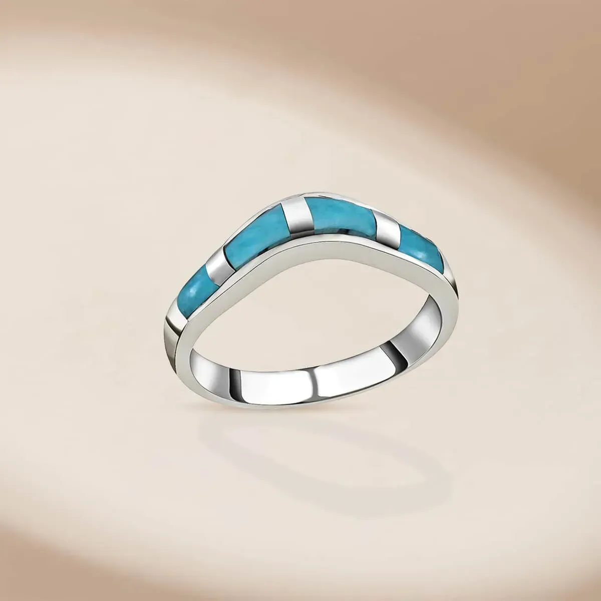 Santa Fe Style Kingman Turquoise Band Ring in Sterling Silver on neutral background.