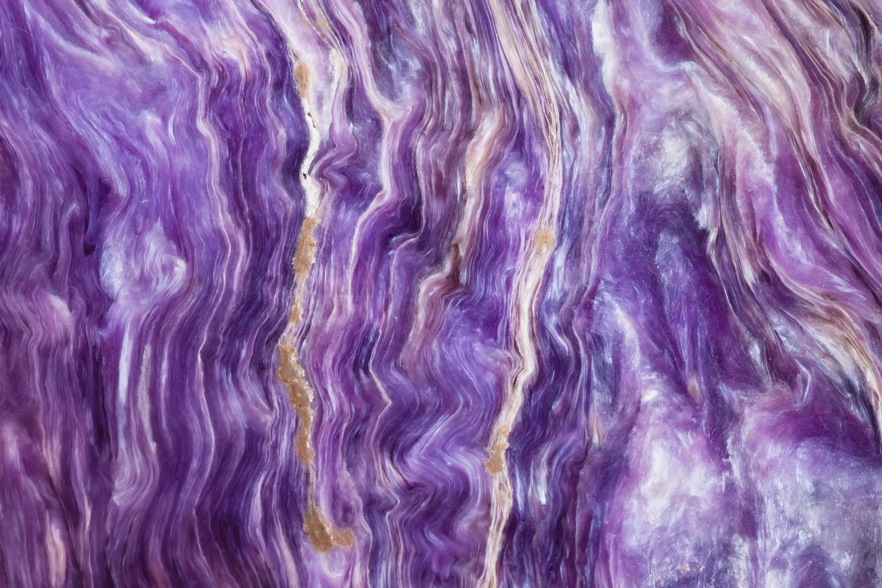 Closeup of charoite gemstone.