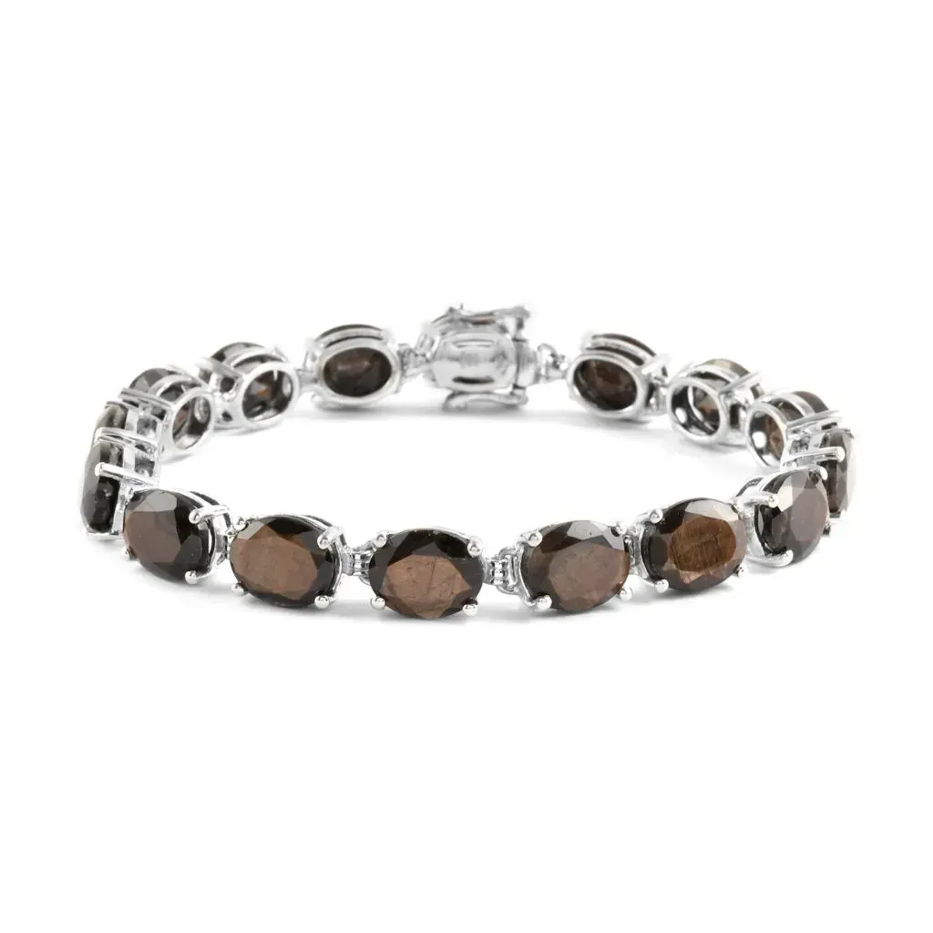 Chocolate sapphire line bracelet in sterling silver. 