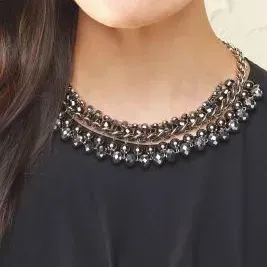 Short necklace paired with crew top.