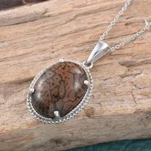 Dino bone gembone pendant in sterling silver. 