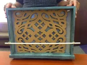 Hanging bar on picture frame.