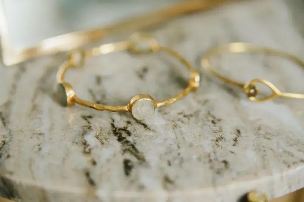 Gold jewelry on marble.