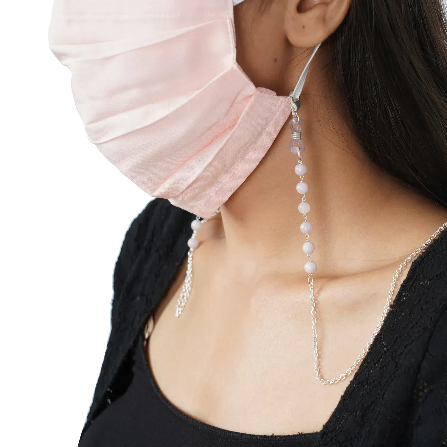 Close up of face mask chain necklace.
