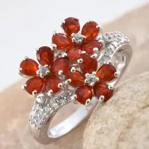 Floral fire opal ring in sterling silver.