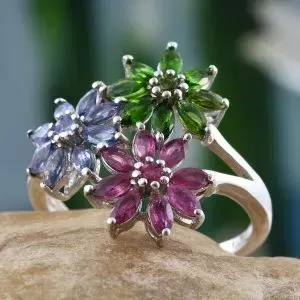 Multi-gem floral cluster ring in sterling silver.