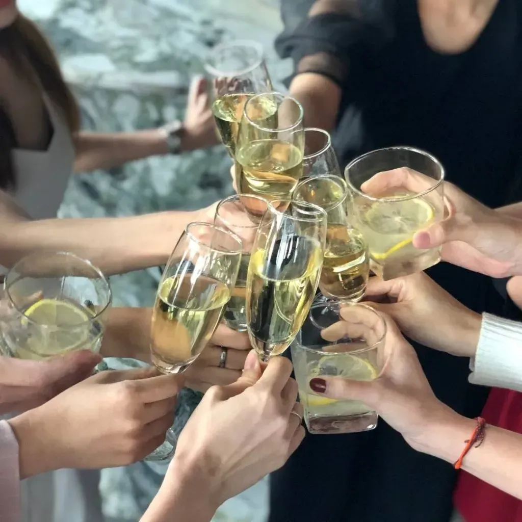 Having a Galentine's Day toast.