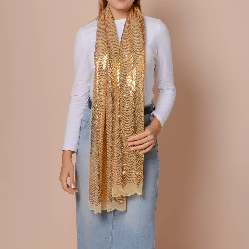 Woman wearing gold sequin scarf. 