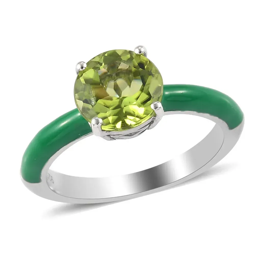 Giuseppe Perez green enamel ring with green gemstone.