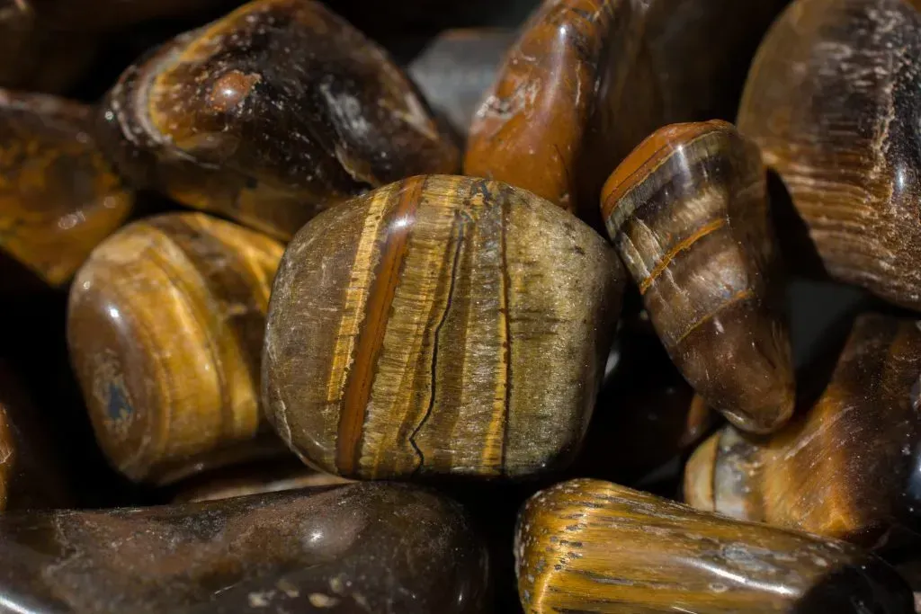 Large polished tiger's eye gems.