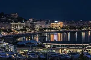 The coast of Cannes, France at night.